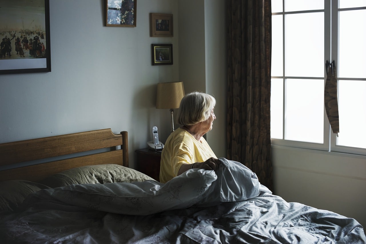 Elderly woman alone in a nursing home